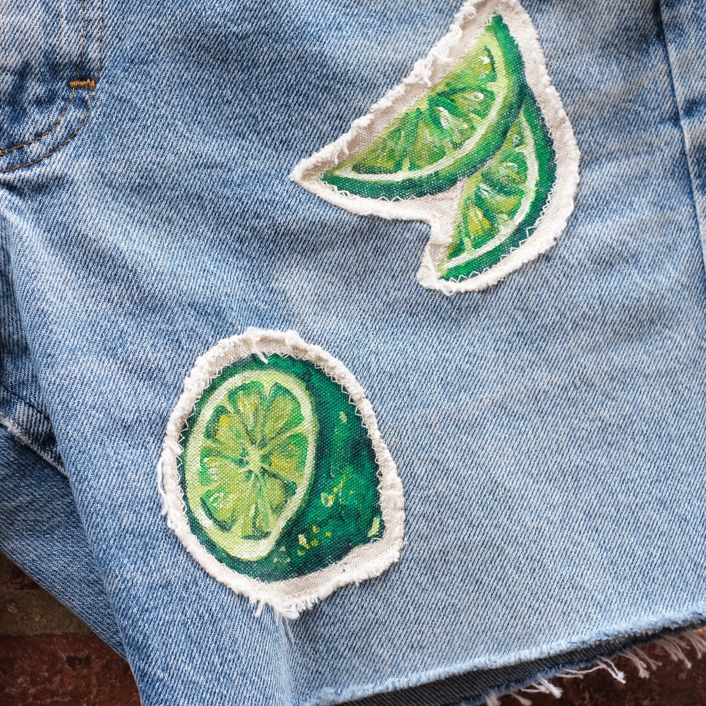 fruit patch denim cutoffs - lime 34